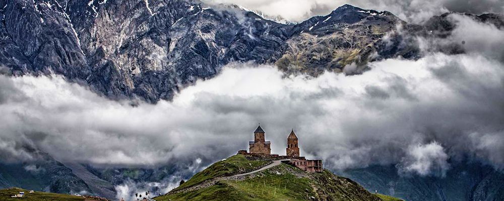 tour in kazbegiAnanuri  Gudauri mosaic panorama  Acidic waters  Groveli waterfall  Kazbegi  The Gergeti Trinity      We will see Ananuri Fortress located on the river Aragvi coastline. Its earliest parts date back to the XIII century. The castle is in the